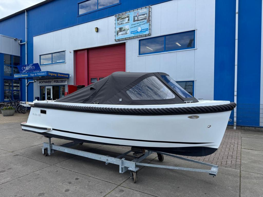 Maxima 600 met Honda 20 pk